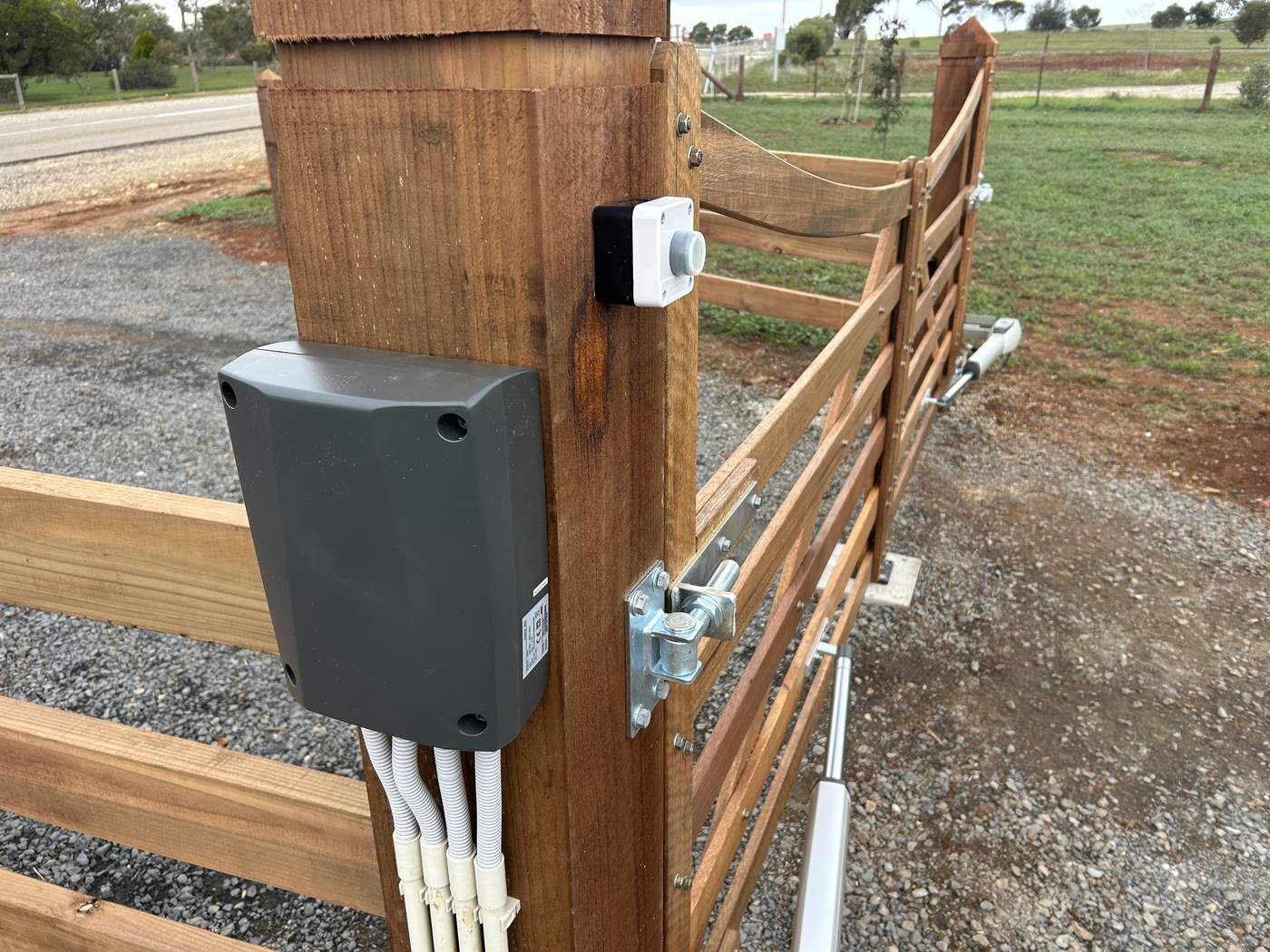 Control box and wiring on a gate post