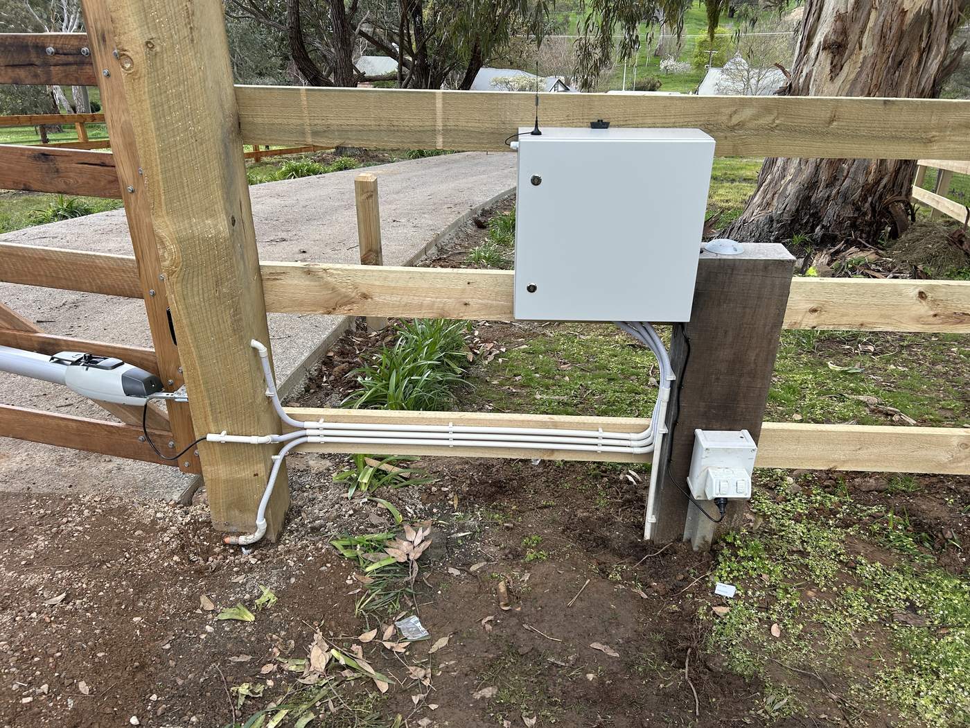 Control box mounted on the fence