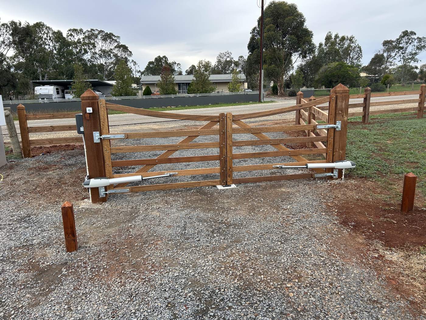 The same driveway with the gates hung and motors fitted
