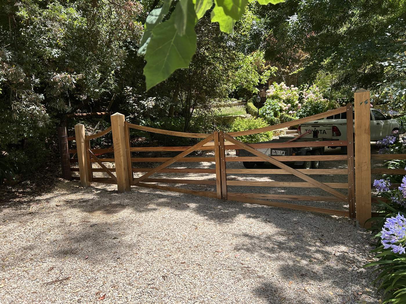 Timber gates set into a garden entrance