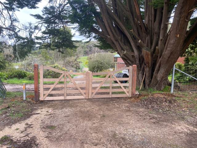Unstained timber double gates