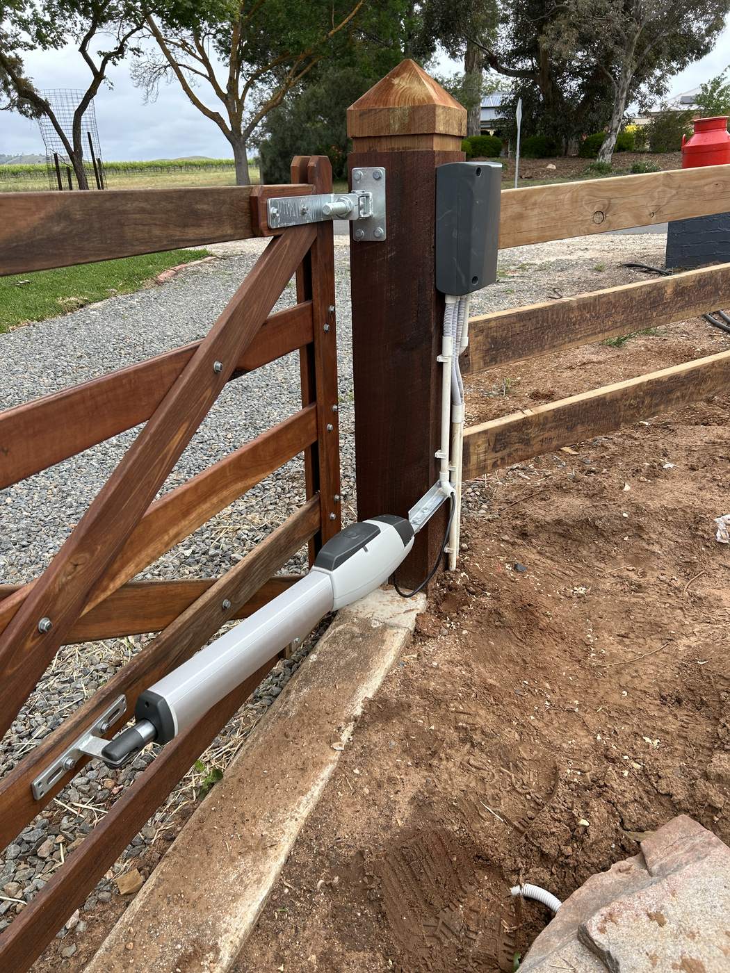 Keypad post beside a motorised gate