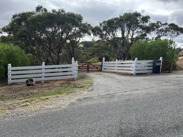 White post and rail with matching gates