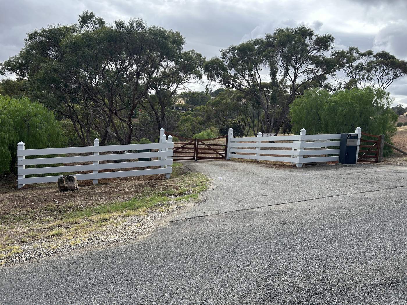White post and rail with matching gates